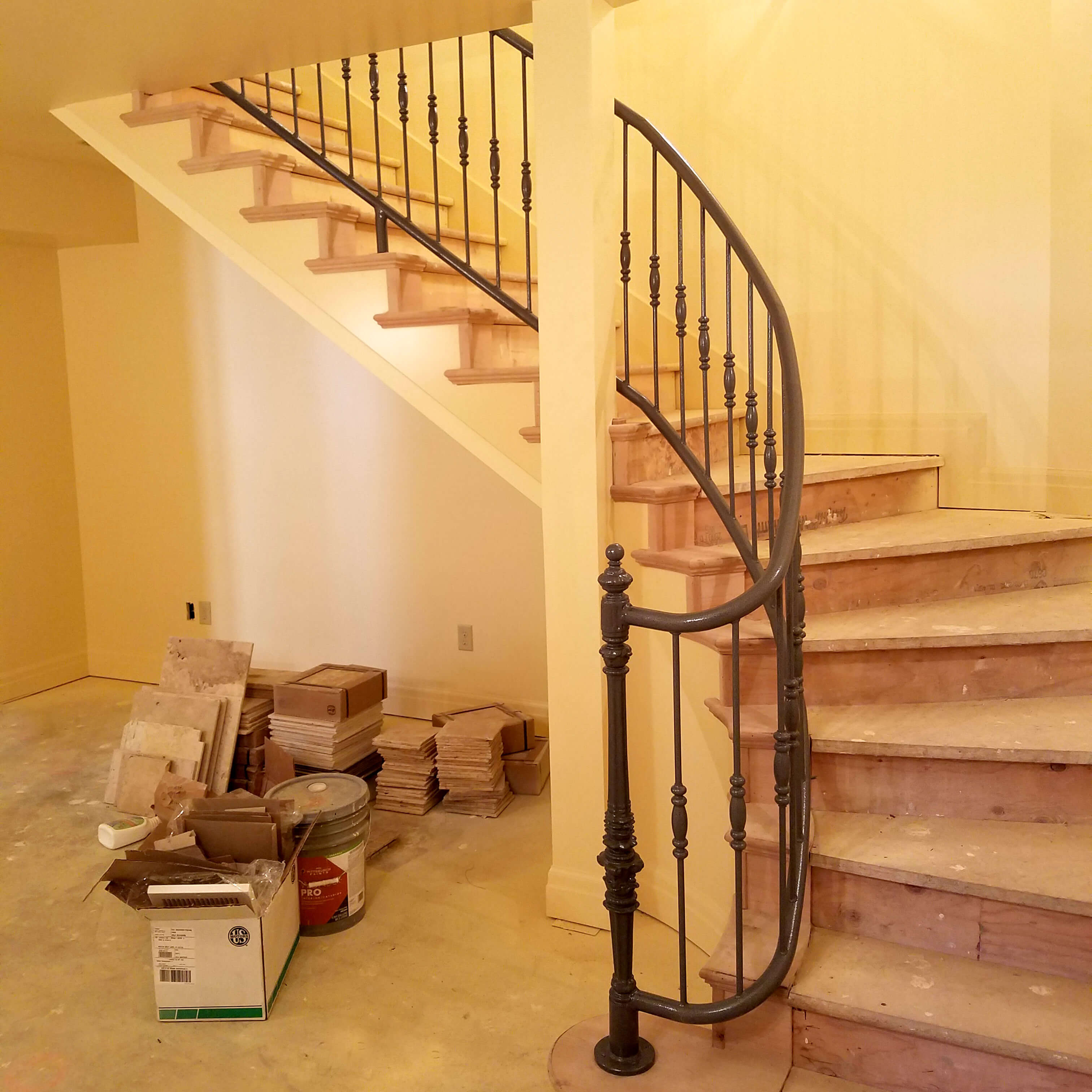 Million dollar home basement curved stair railing